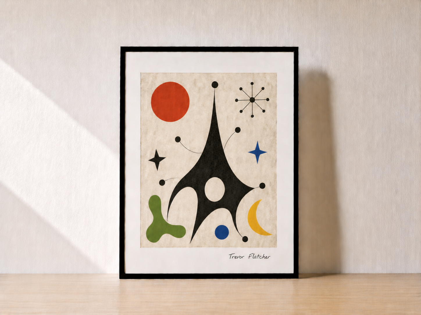 Abstract art framed on a shelf